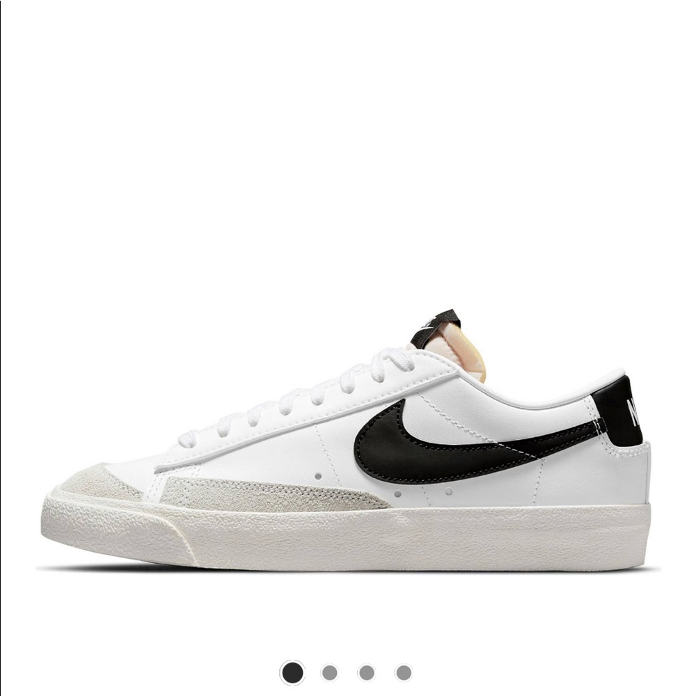 Nike Women's White Sneakers with Black Swoosh
